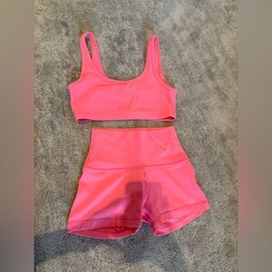 pink/peachy-ish aritzia workout set